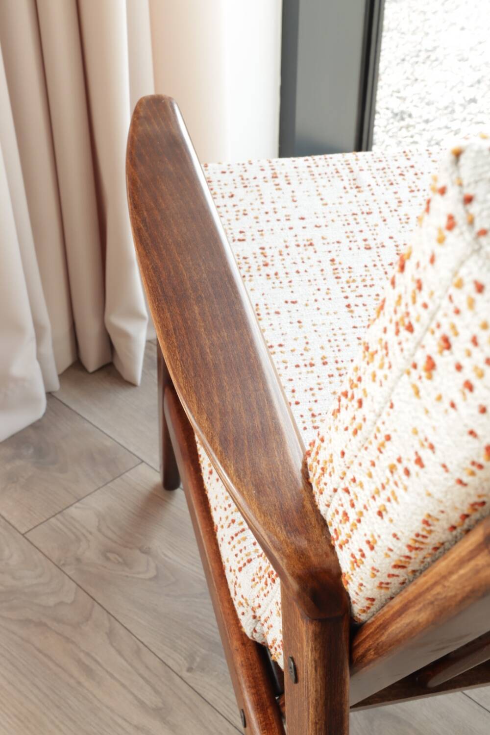 Vintage Danish boucle armchair with orange polka dots from the 1960s.