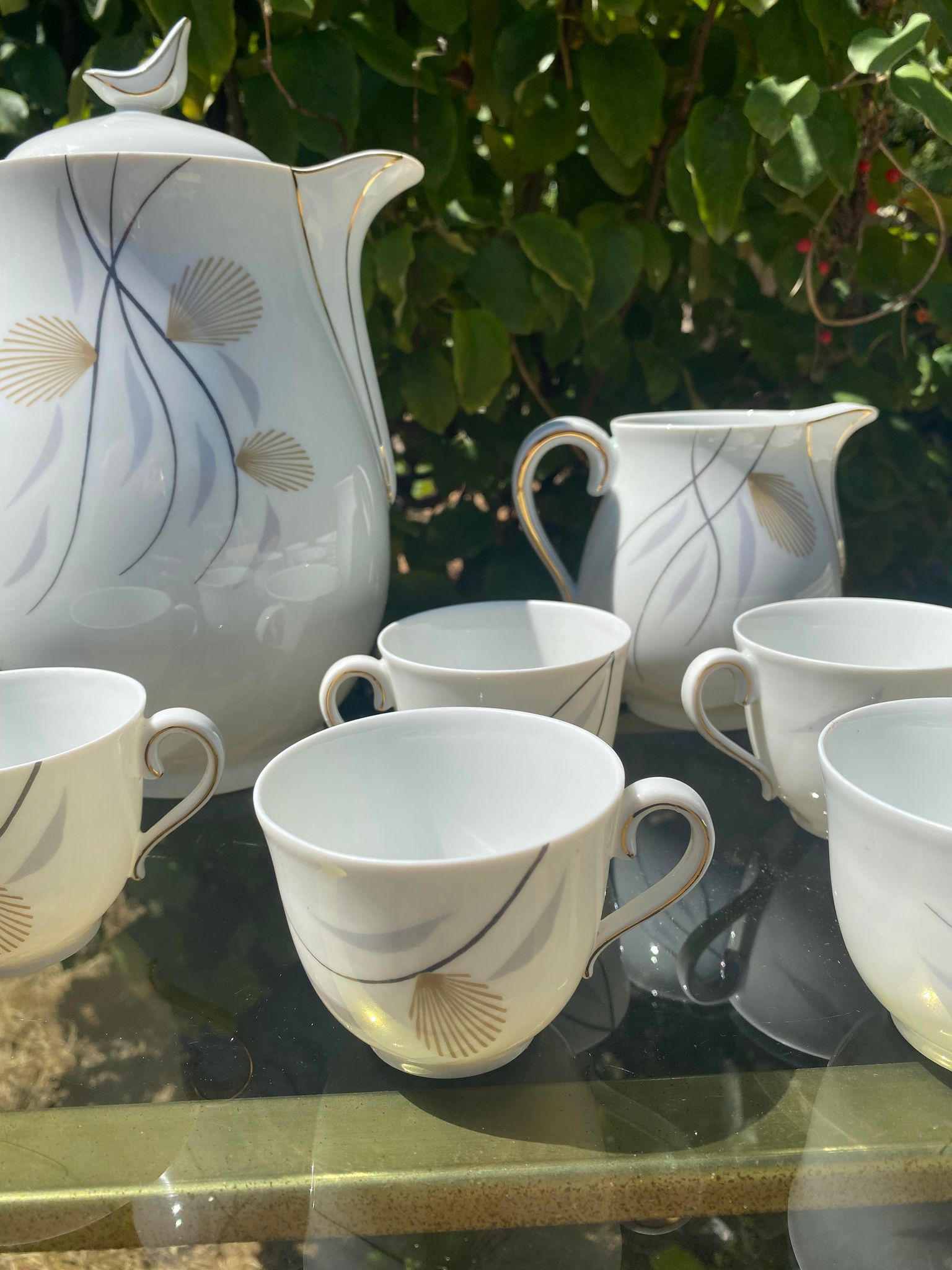 Porcelain coffee service by Charles Ahrenfeldt from Limoges France