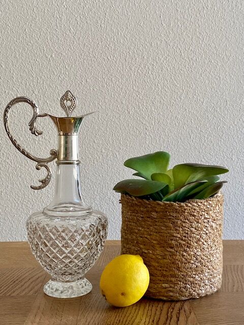Glass and silver metal ewer