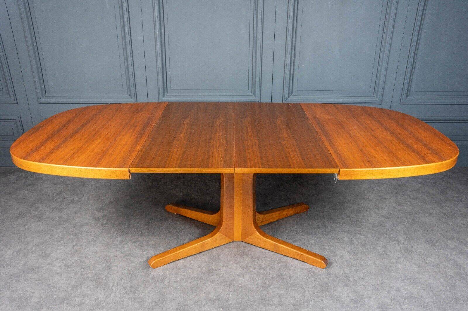 Dining room table with extensions French work 1970