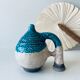 Poterie en terre cuite émaillée bleu et crème