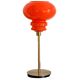 Lampe de table à poser réalisée avec un abat-jour vintage orange en verre et un pied doré
