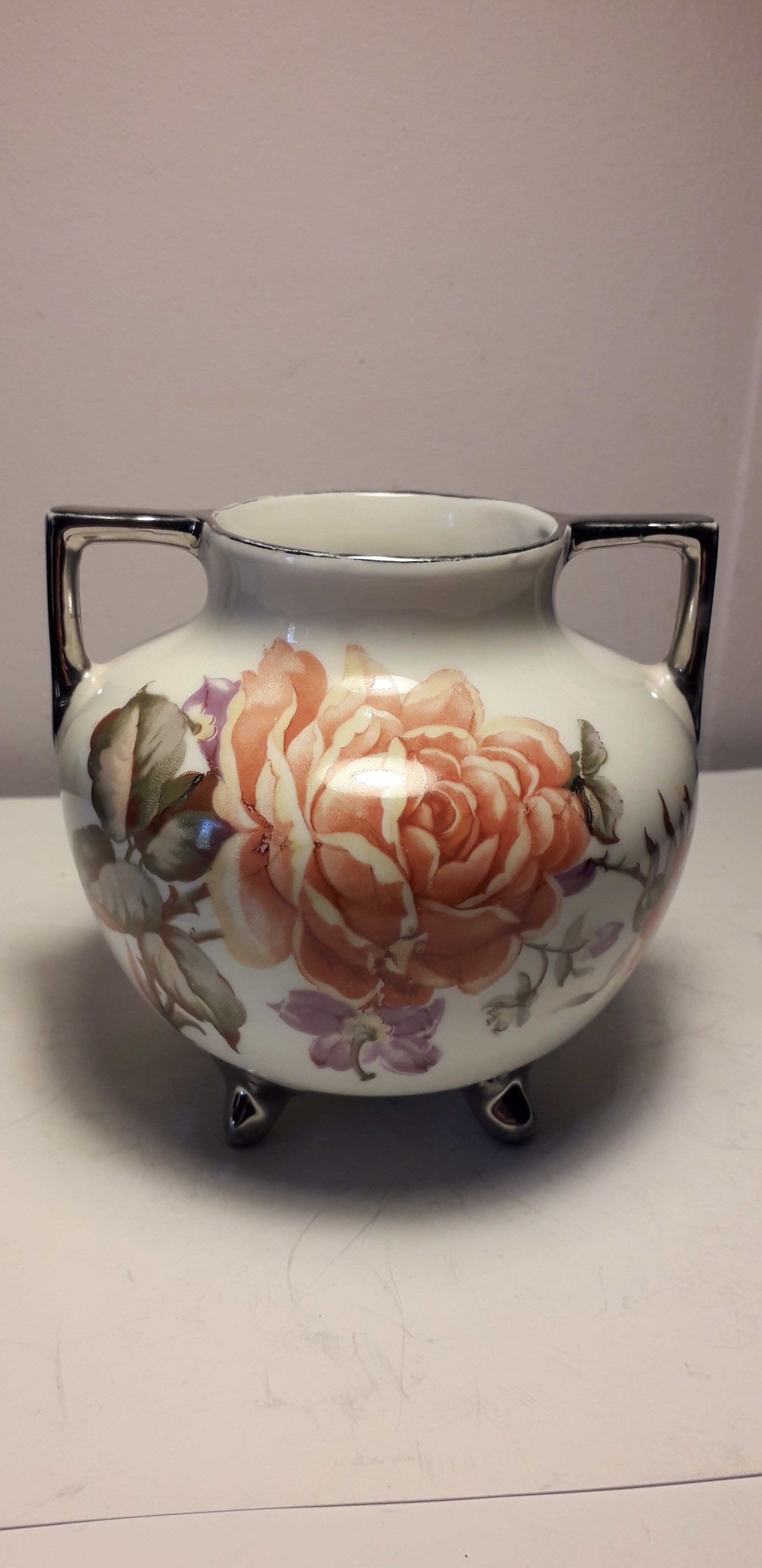 Small old vase with handles in Limoges porcelain.