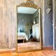 Antique mirror with a gilded pediment Louis XVI