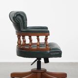 Dark green chesterfield office chair in cowhide leather on wheels