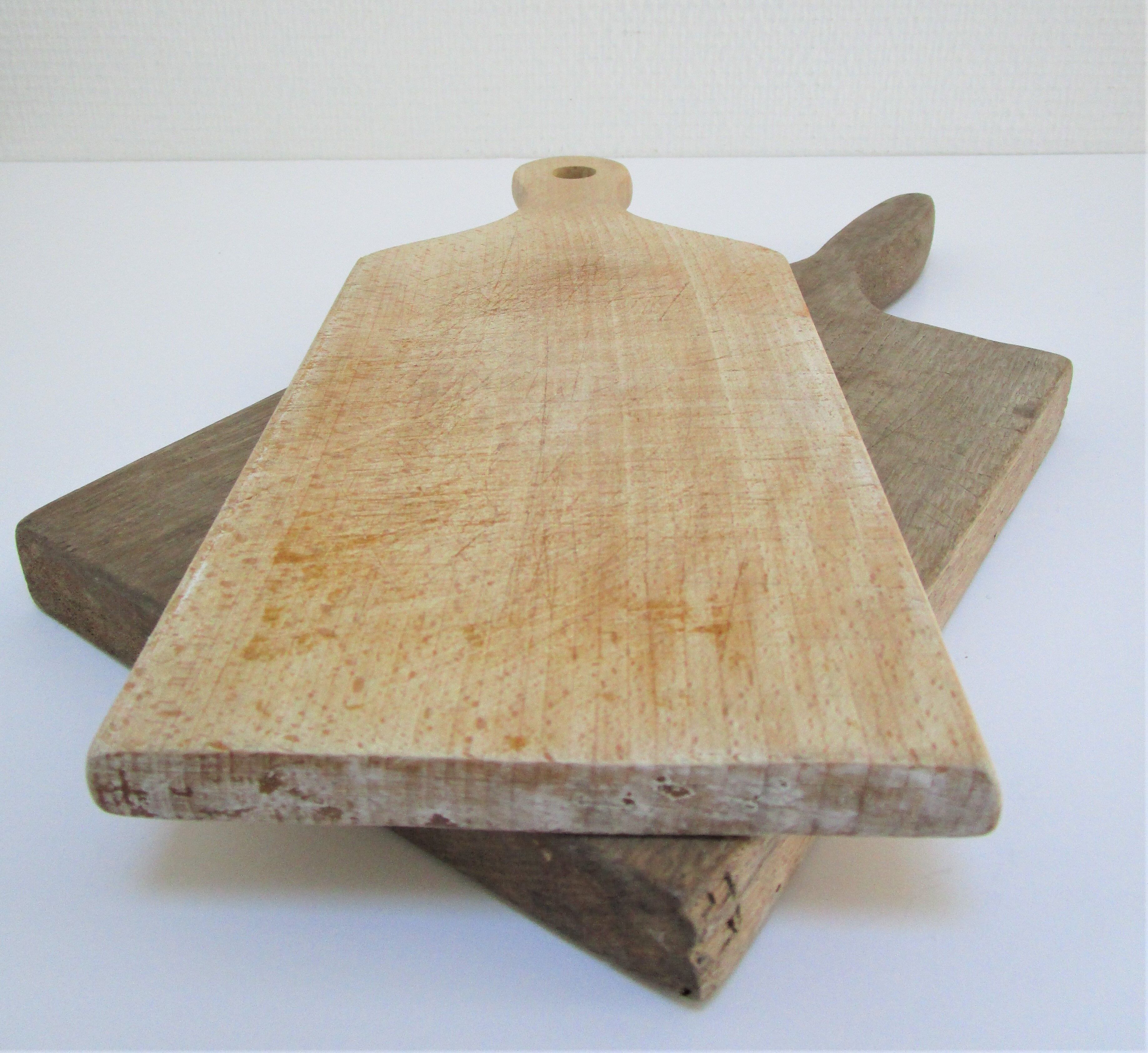 Two vintage solid wood cutting boards