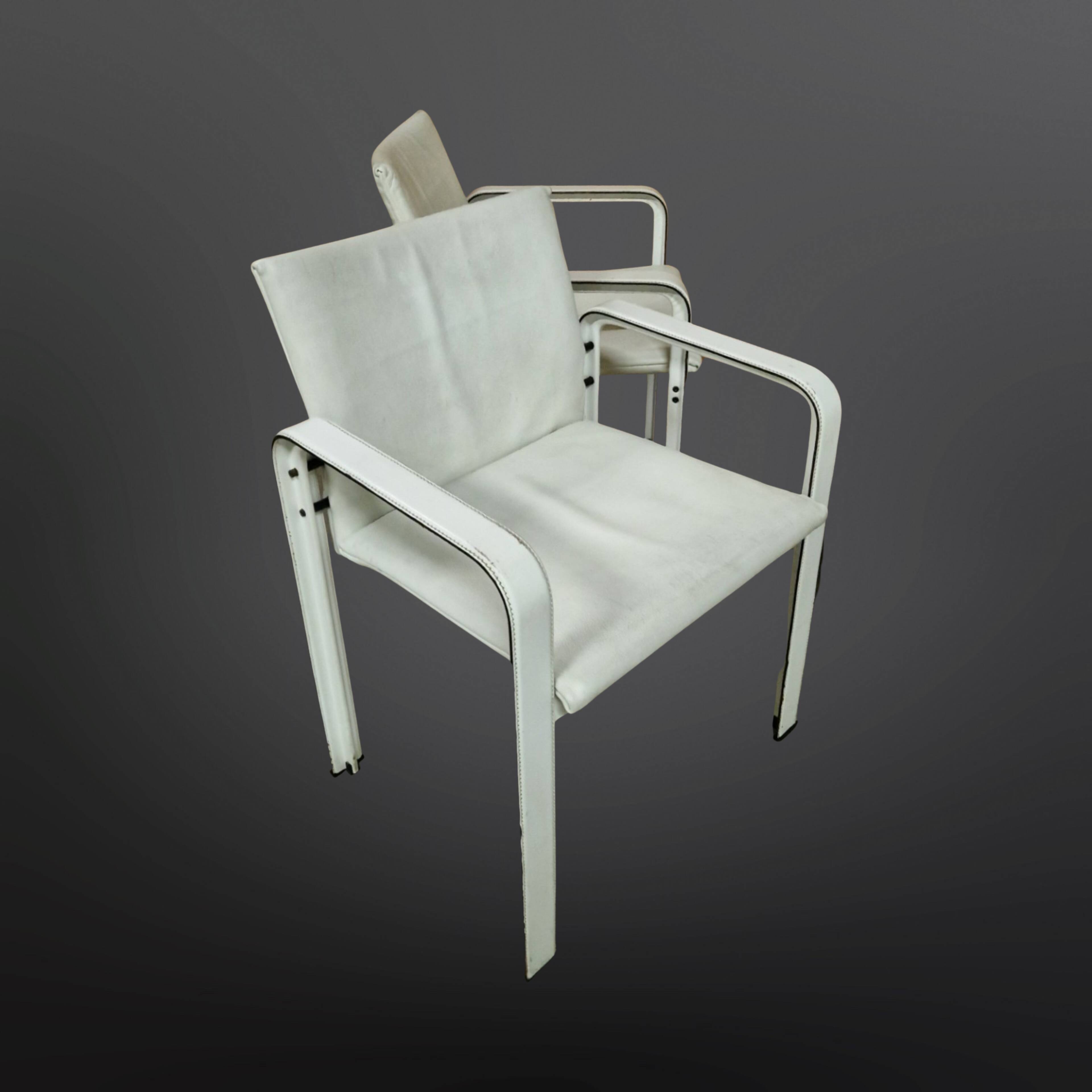 Set of 4 leather dining chairs by Jacques Toussaint and Patrizia Angeloni for Matteo Grassi. Italy 1