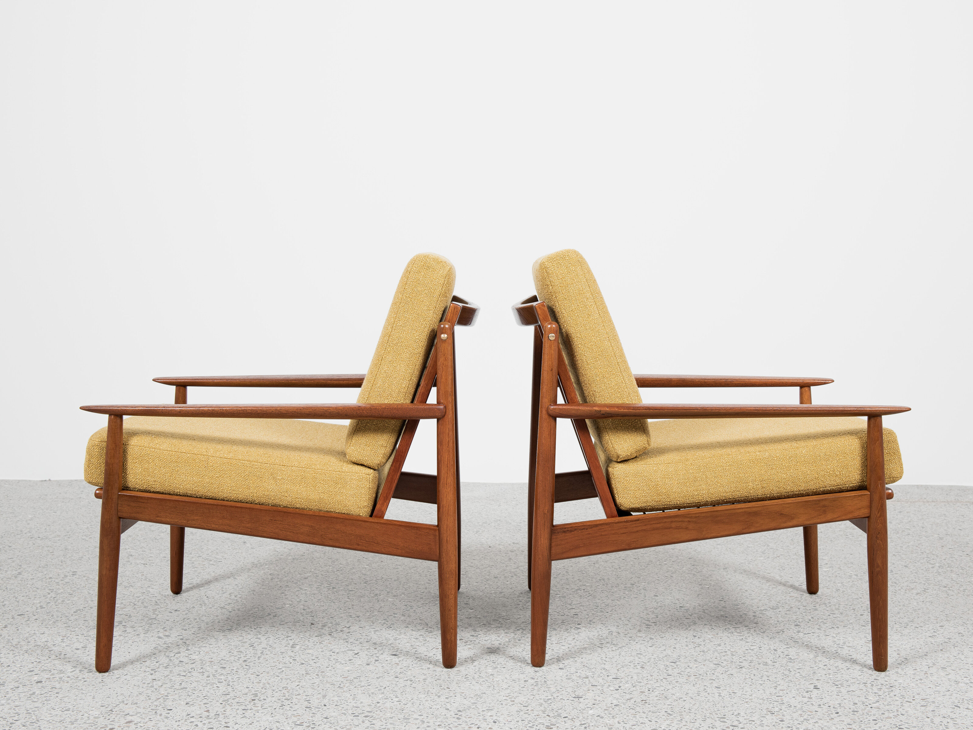Midcentury Danish pair of easy chairs in teak by Arne Vodder for Glostrup