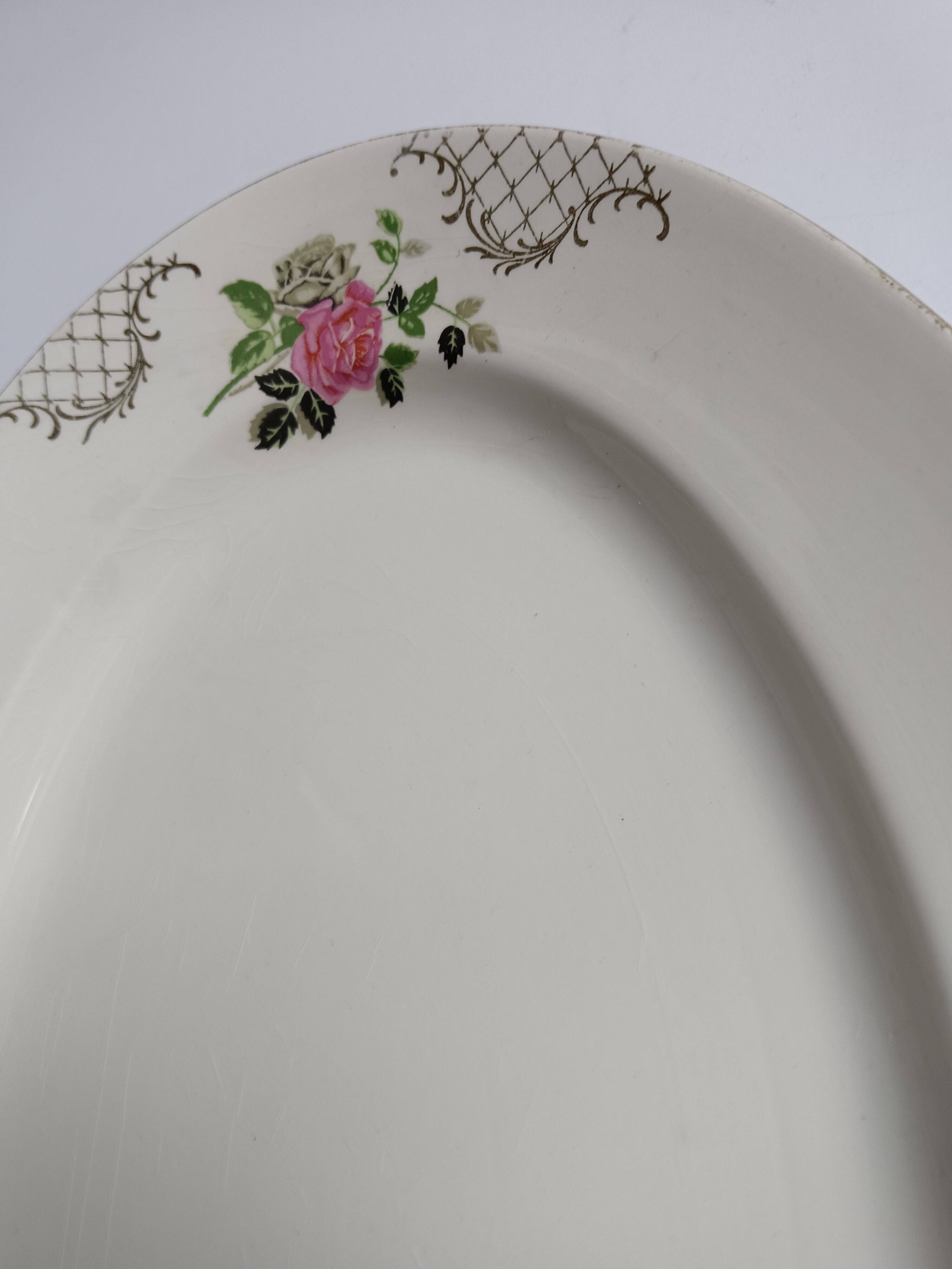 Oval plate Sarreguemines cream with pink gilding, antique.
