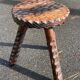Brutalist low tripod wooden stool