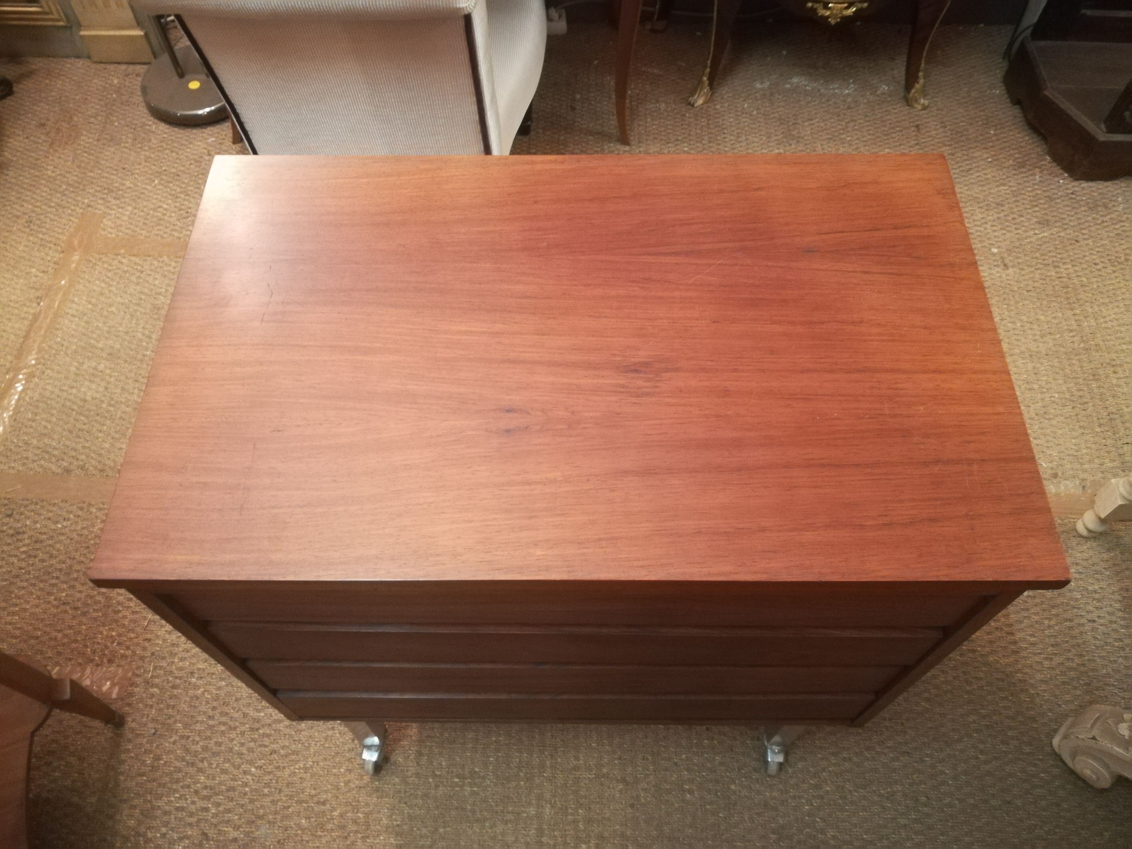 Rosewood and brushed metal chest of drawers