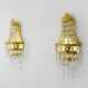 Pair of vintage 3-tiered hot air balloon wall sconces with glass tassels. 1960s