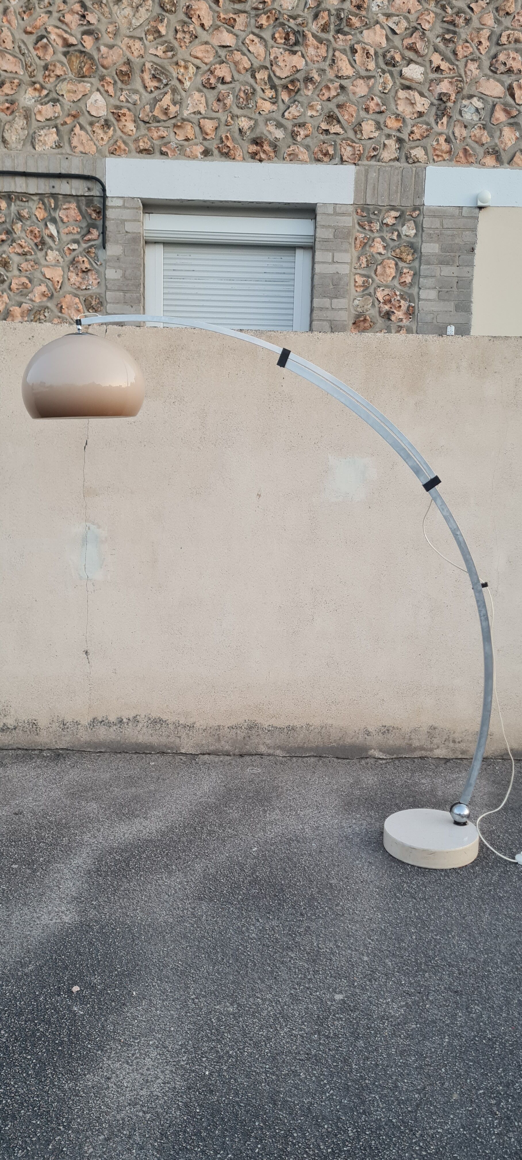 Arch floor lamp by Harvey guzzini 70s