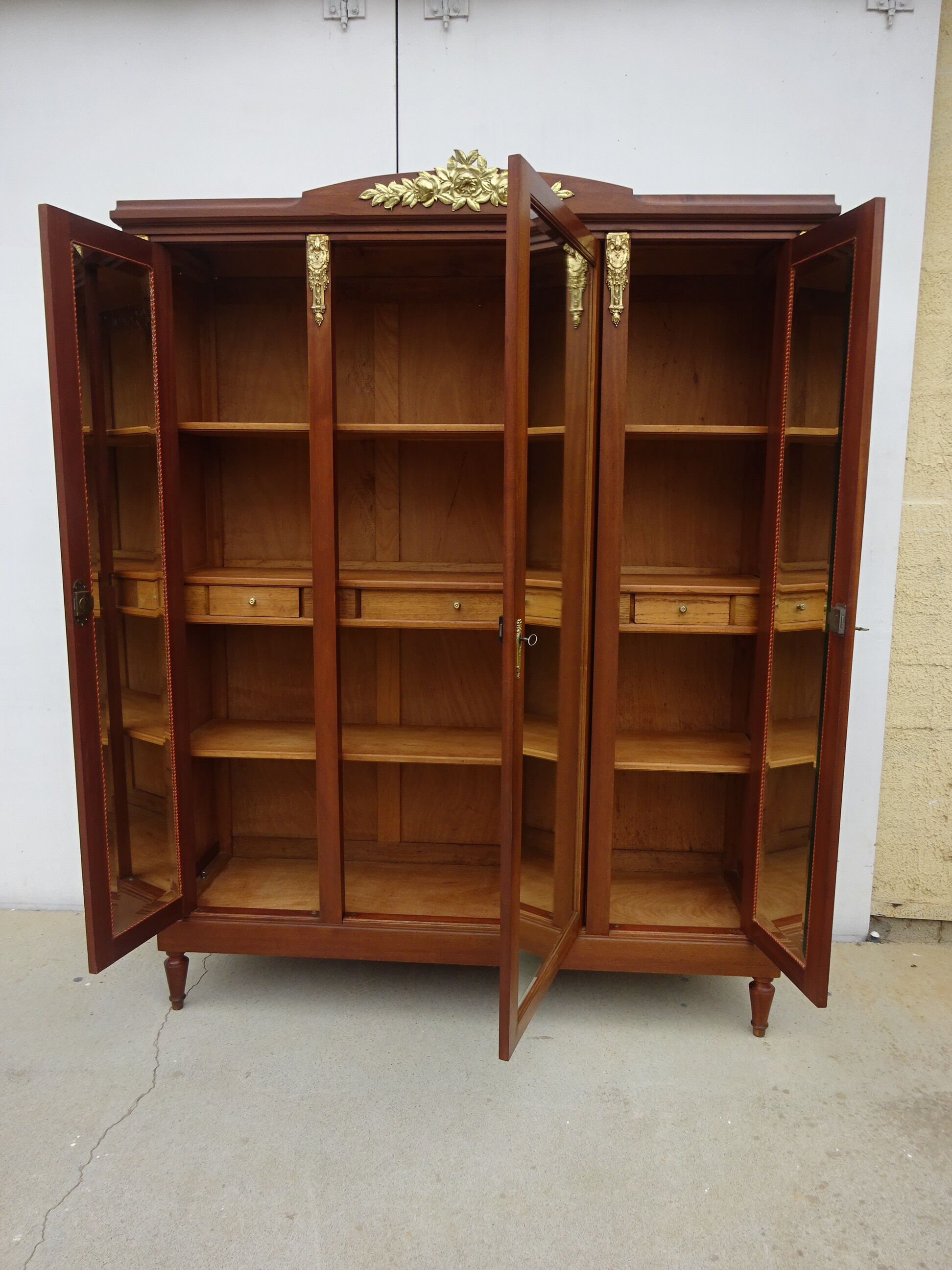 Louis XVI style wardrobe late nineteenth century, mahogany and marquetry