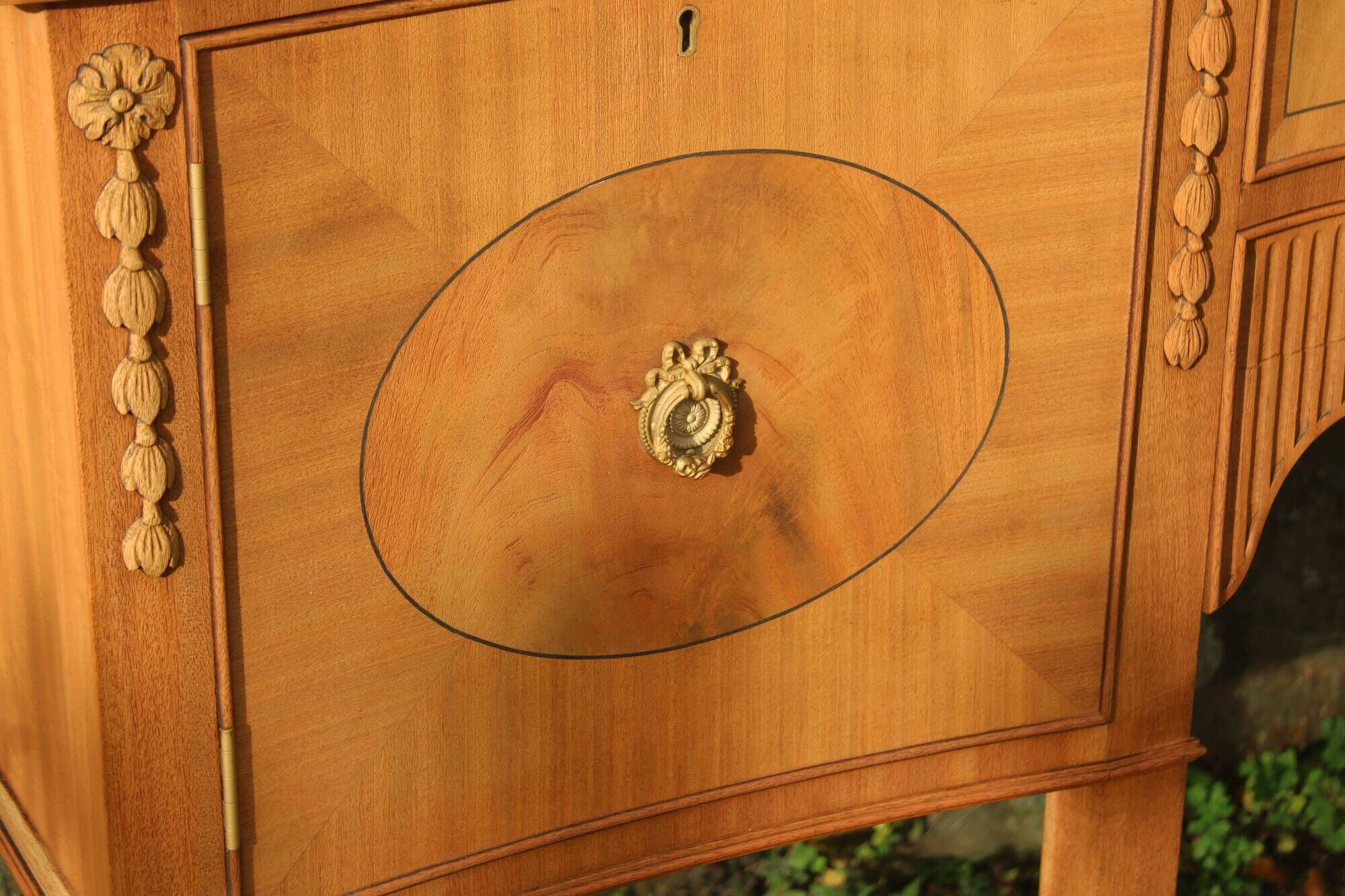 English-made enfilade in Louis XVI style with light wood veneers.