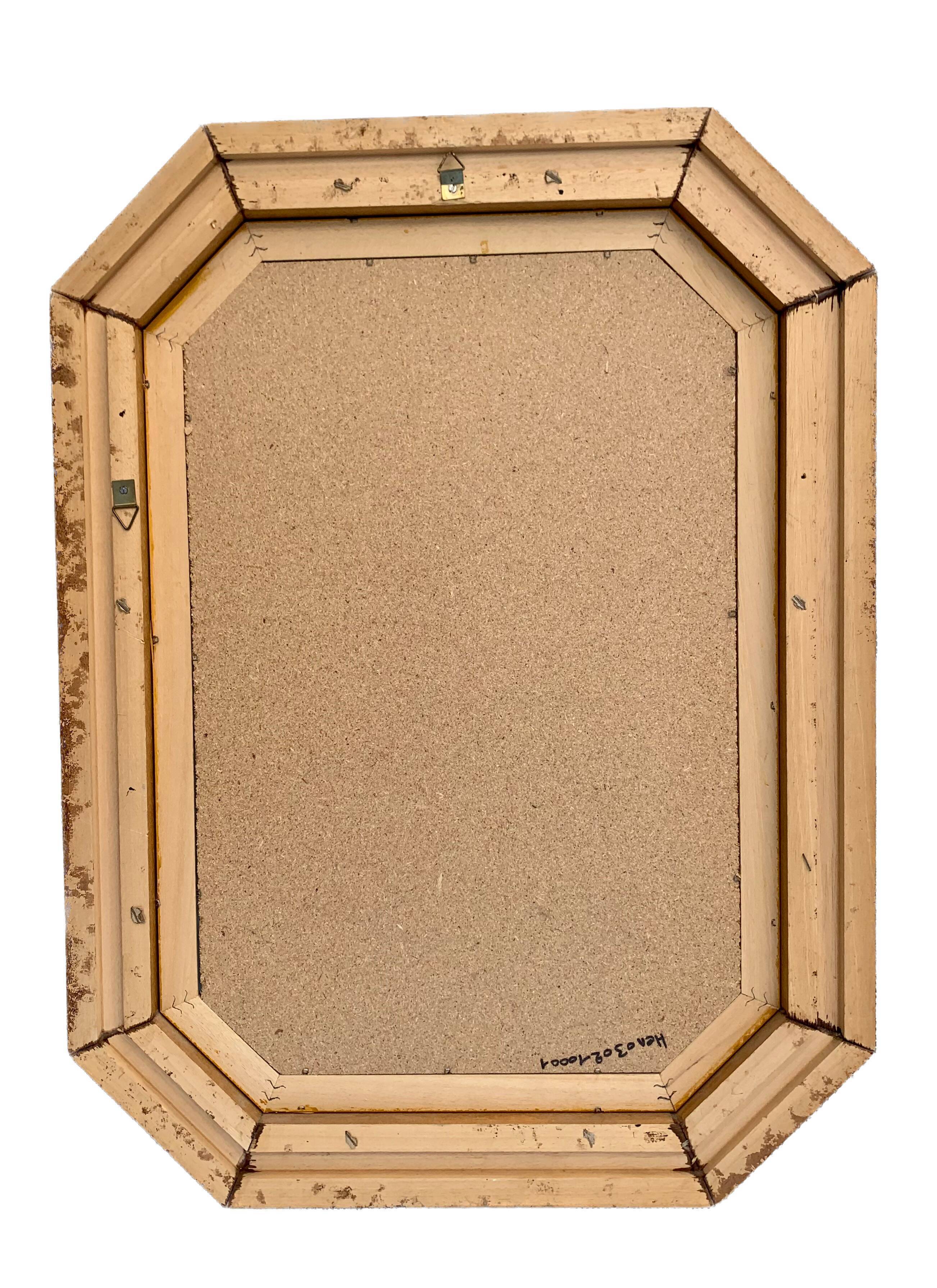 Beveled hexagonal mirror with cut wooden sides, gilded edging decoration