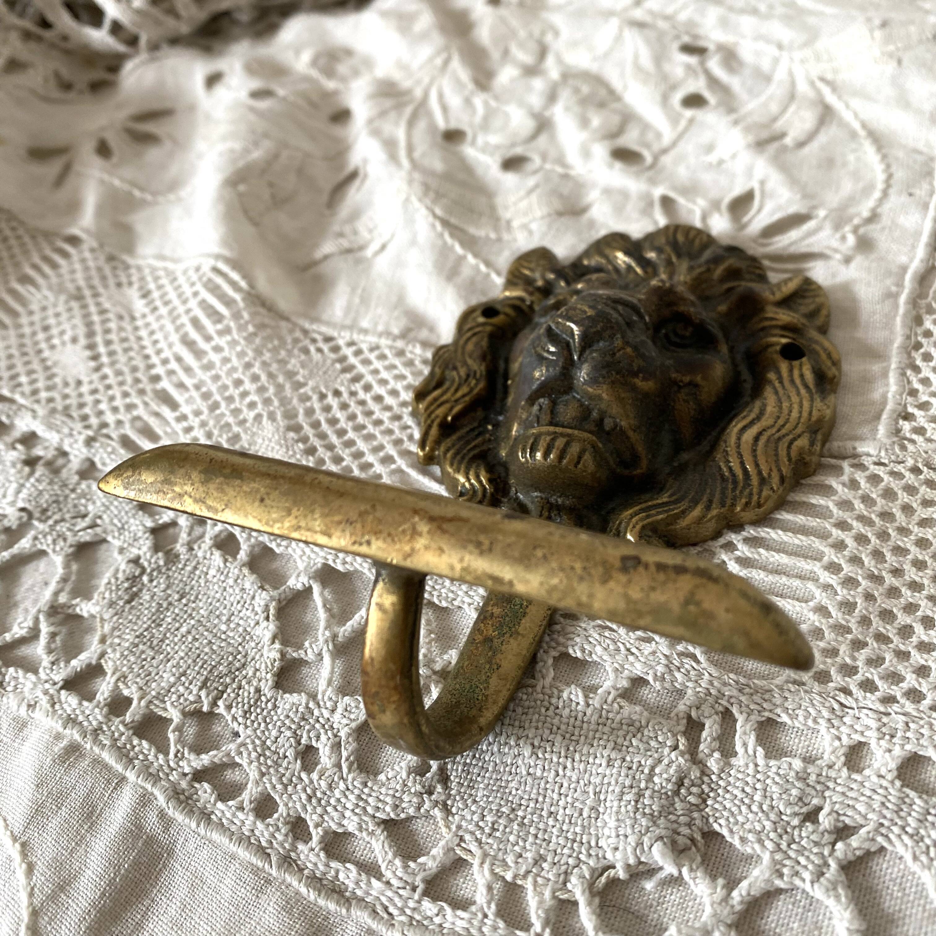 Brass lion head hooks