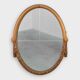 French oval gilded oak  carved art deco mirror, ca. 1925