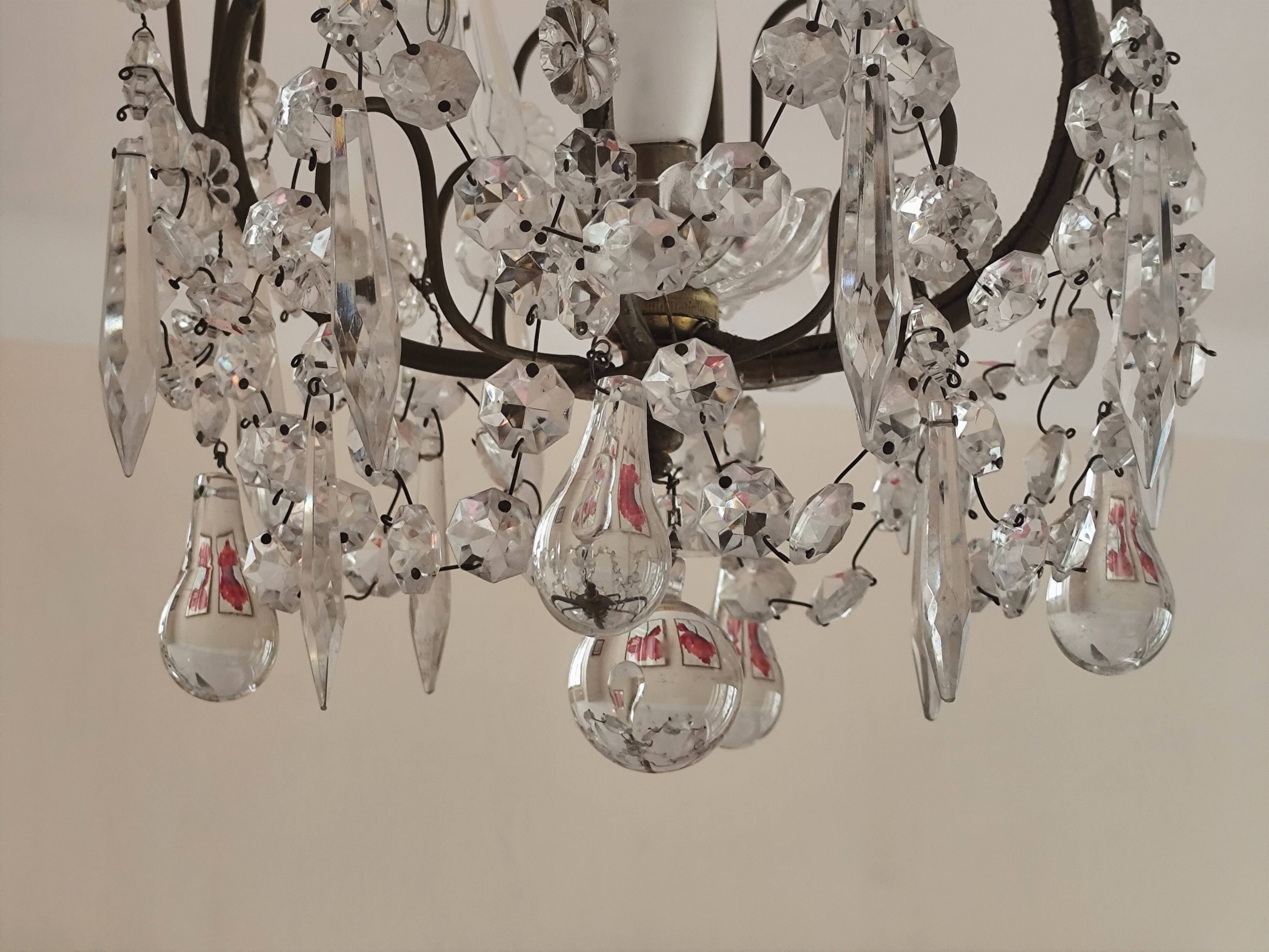 brass cage chandelier with crystal tassels