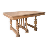 Table de milieu extensible Henri II en noyer massif