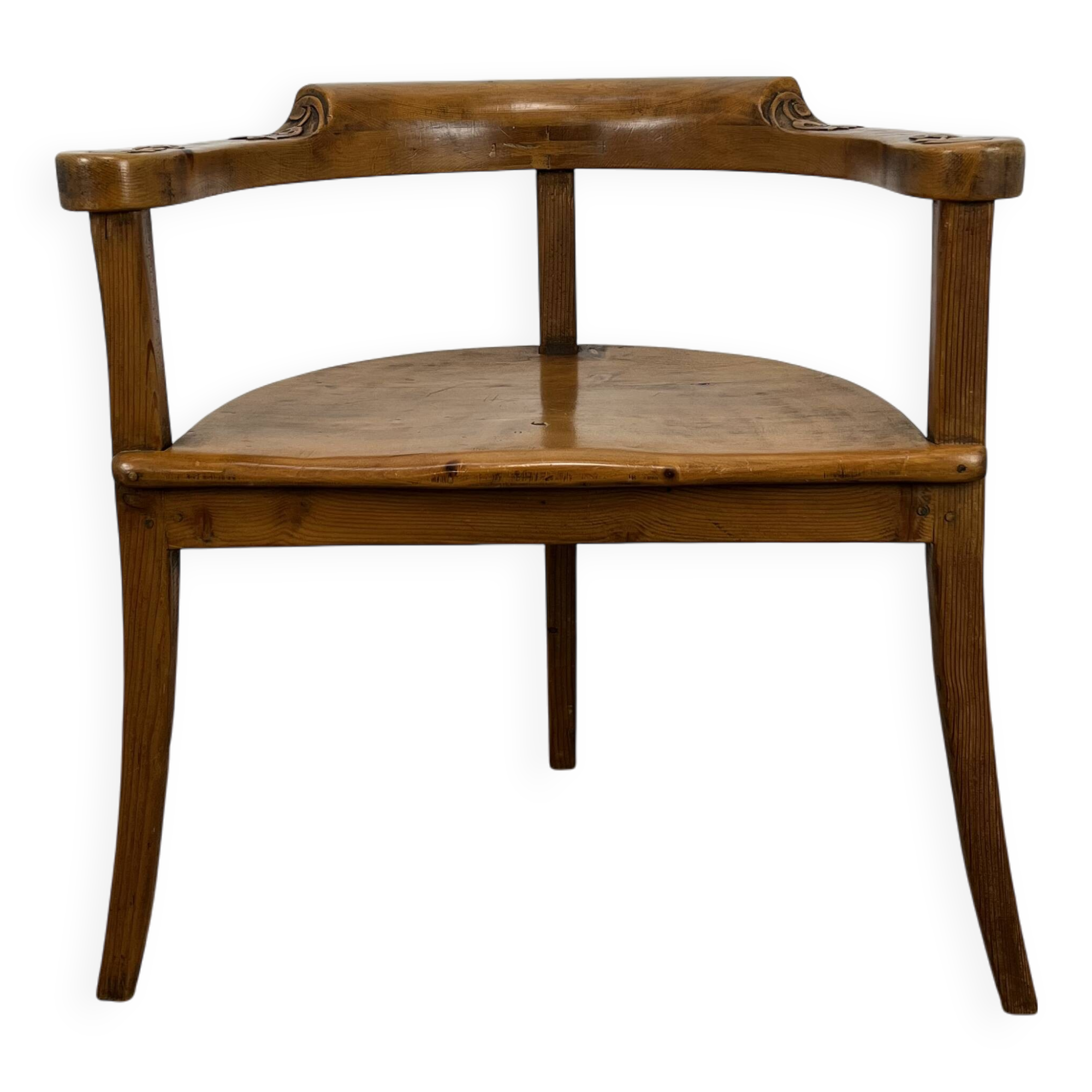 Chalet-style carved wooden tripod armchair