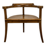 Chalet-style carved wooden tripod armchair