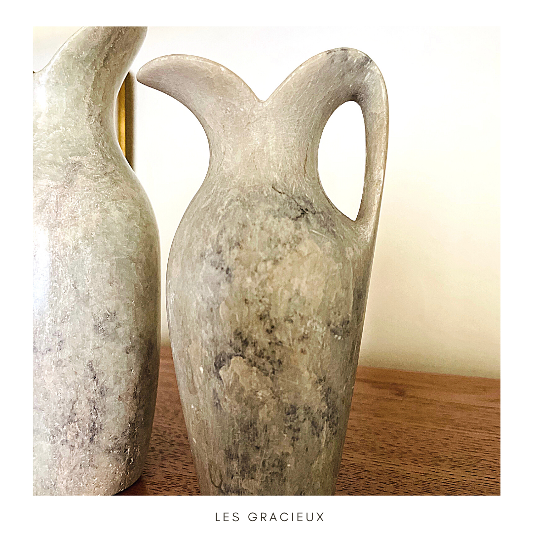 2 jugs in rough cut stone