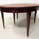 Louis XVI style bandeau table with 6 XIX century tapered legs.
