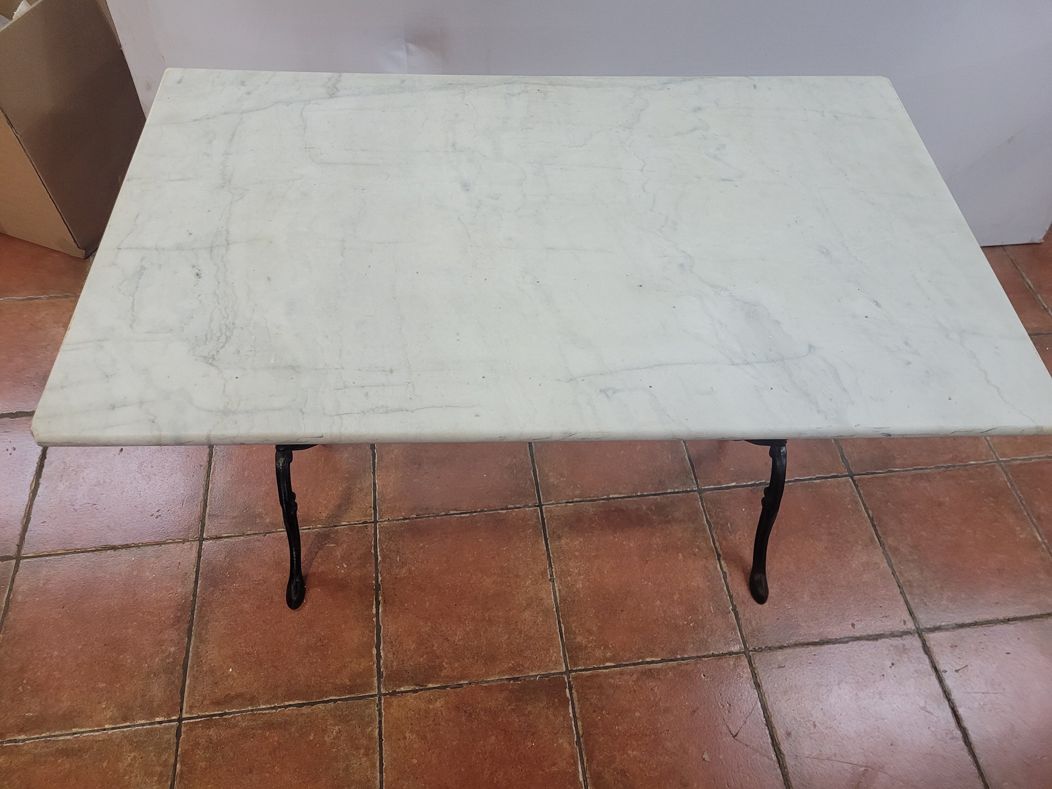Bistro table base cast iron over marble