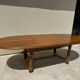 Oak dining table, oval living room table with two extensions.