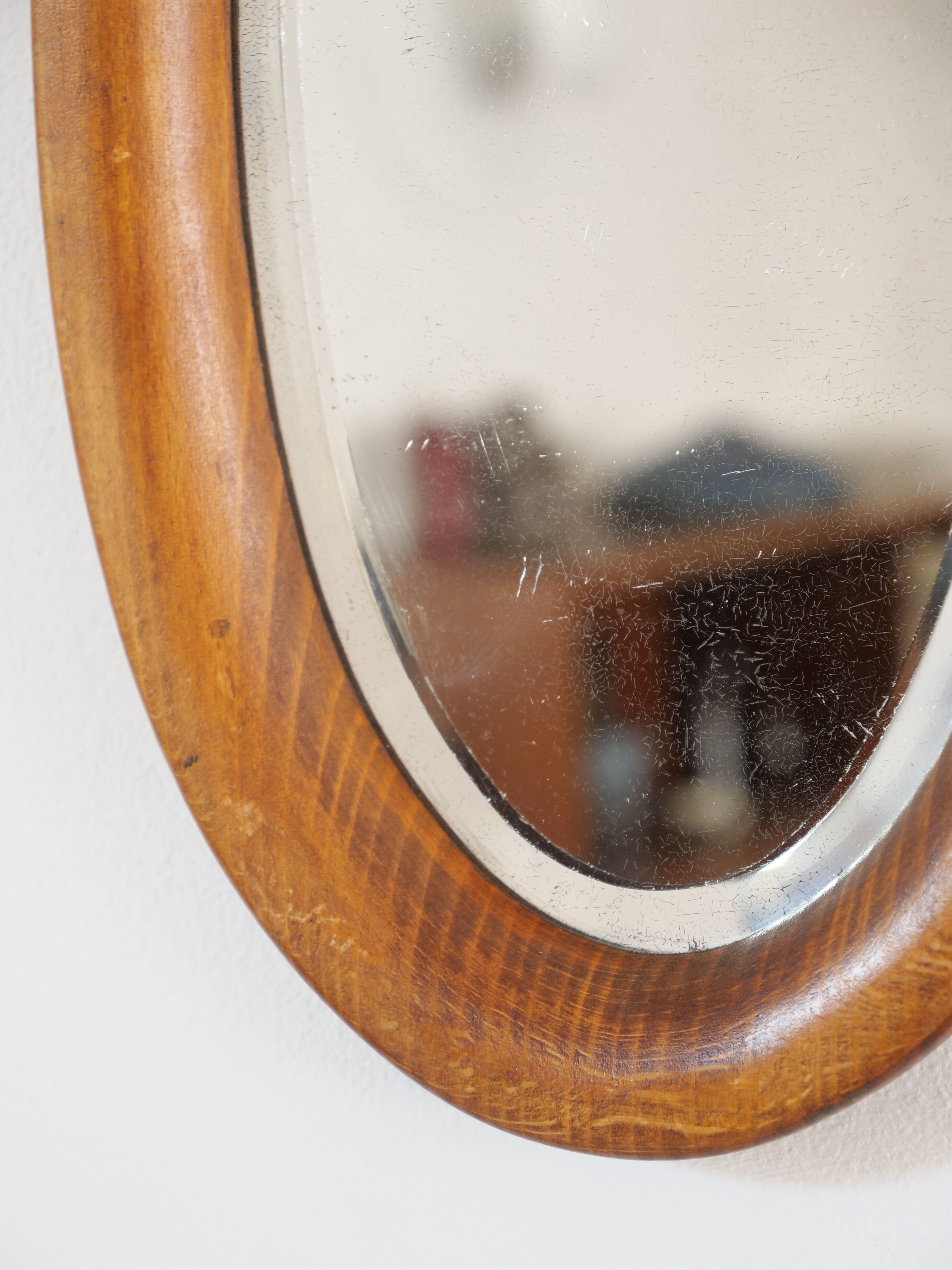 Oval mirror in artisan wood 28x49cm