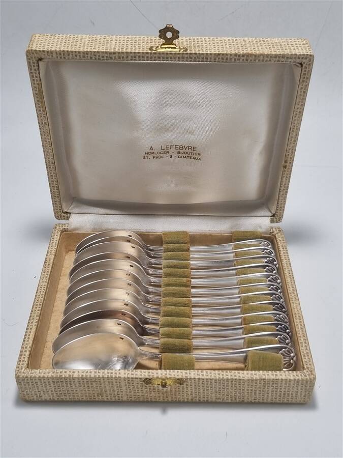 Small silver-plated metal spoons