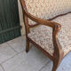 Moulded wooden bench with floral upholstery – Old-fashioned charm