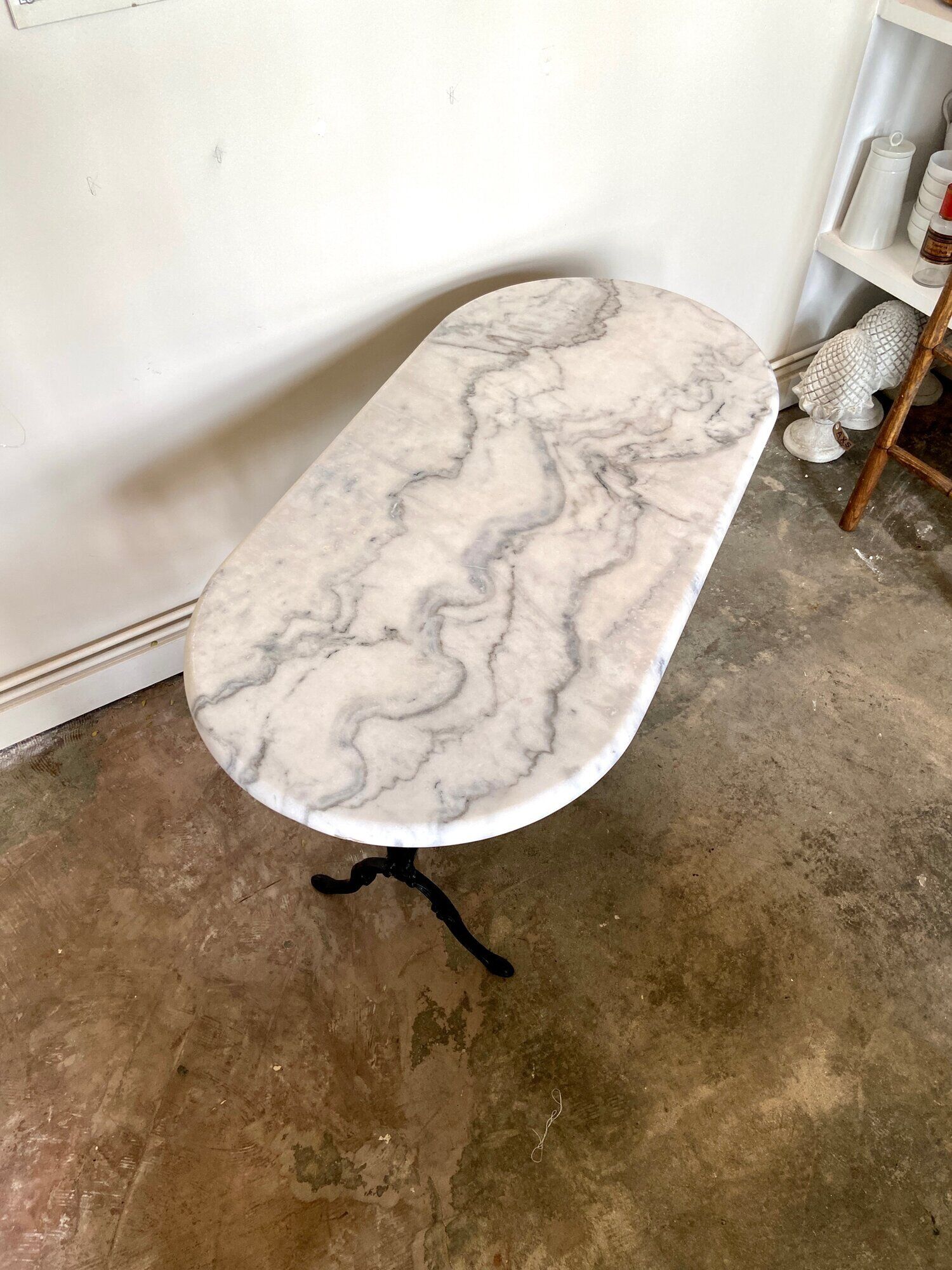 Bistro table in gray marble and cast iron