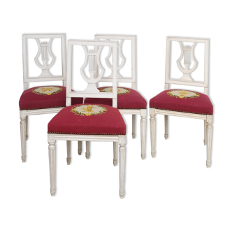 Suite of 4 chairs with lyres back