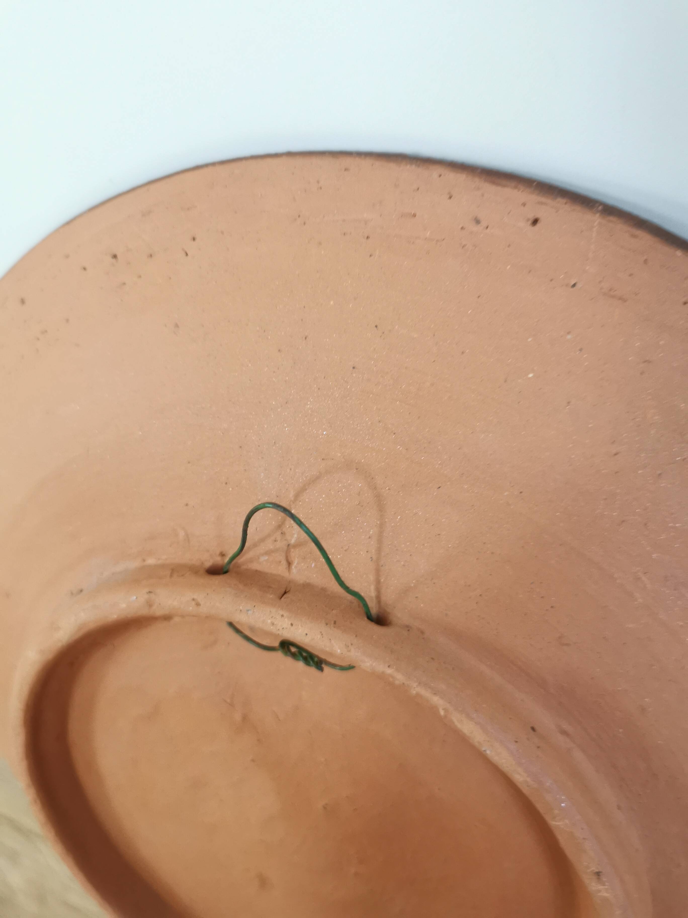 Vintage Embossed Clay Plate: Man Drinking, Retro Wall Decor