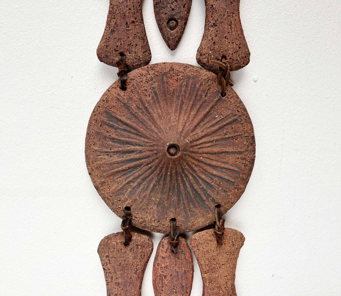 Wall suspension of Danish studio pottery in mid-century brutalist modernist style by Clara Helmich, 1979.