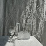 Glass ice or champagne bucket with stylized petal patterns