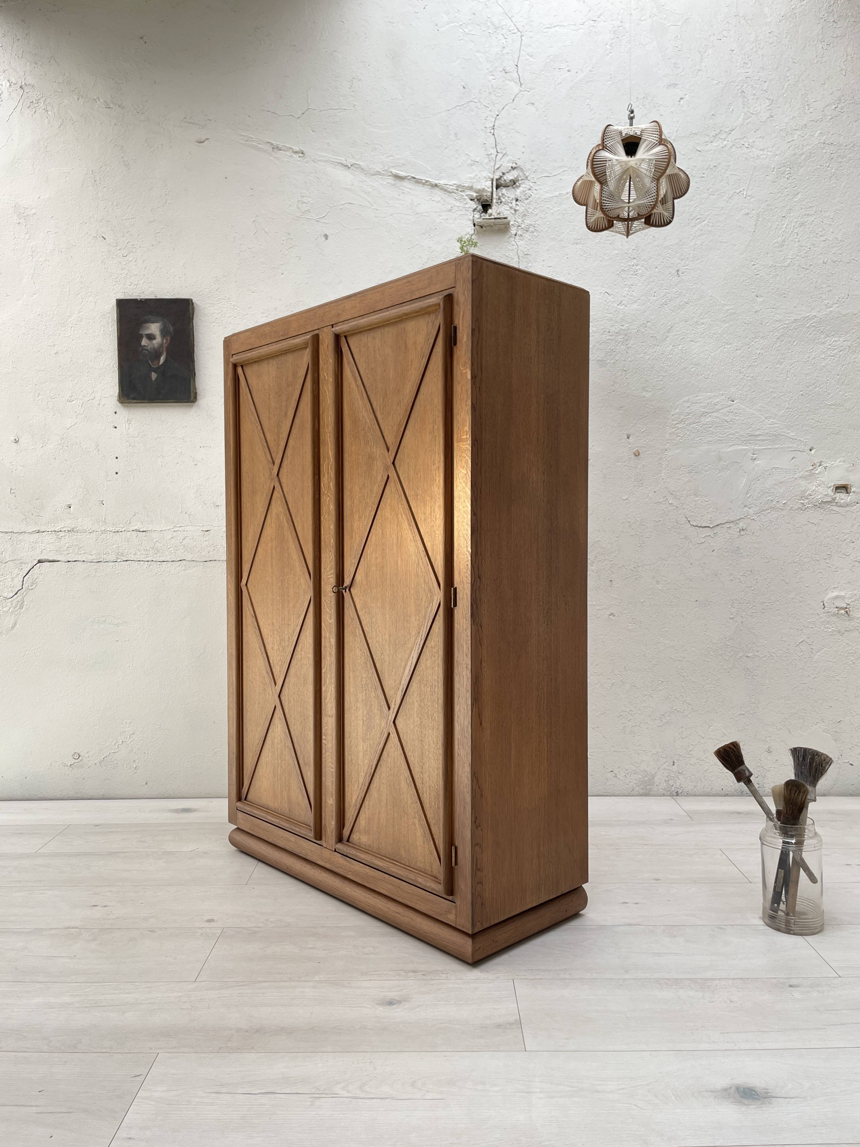 Storage unit in solid oak and veneer, circa 1960.