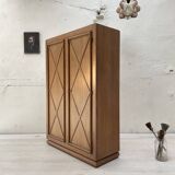 Storage unit in solid oak and veneer, circa 1960.