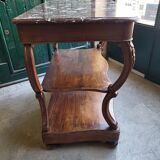 Carved walnut console marble top of the nineteenth century