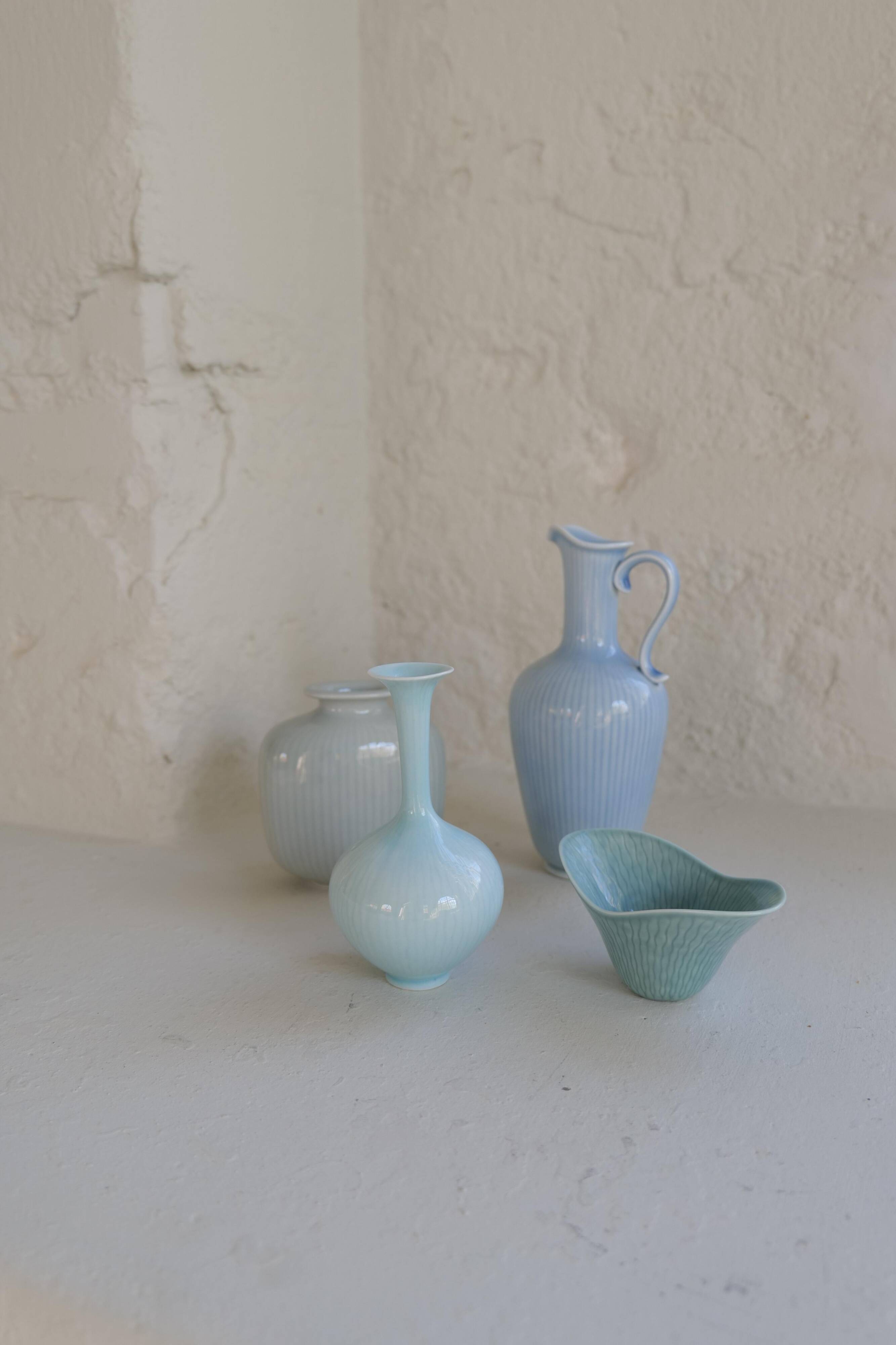 Mid-century modern set of 4 ceramic vases by Rörstrand, Gunnar Nylund, Sweden, 1950s.