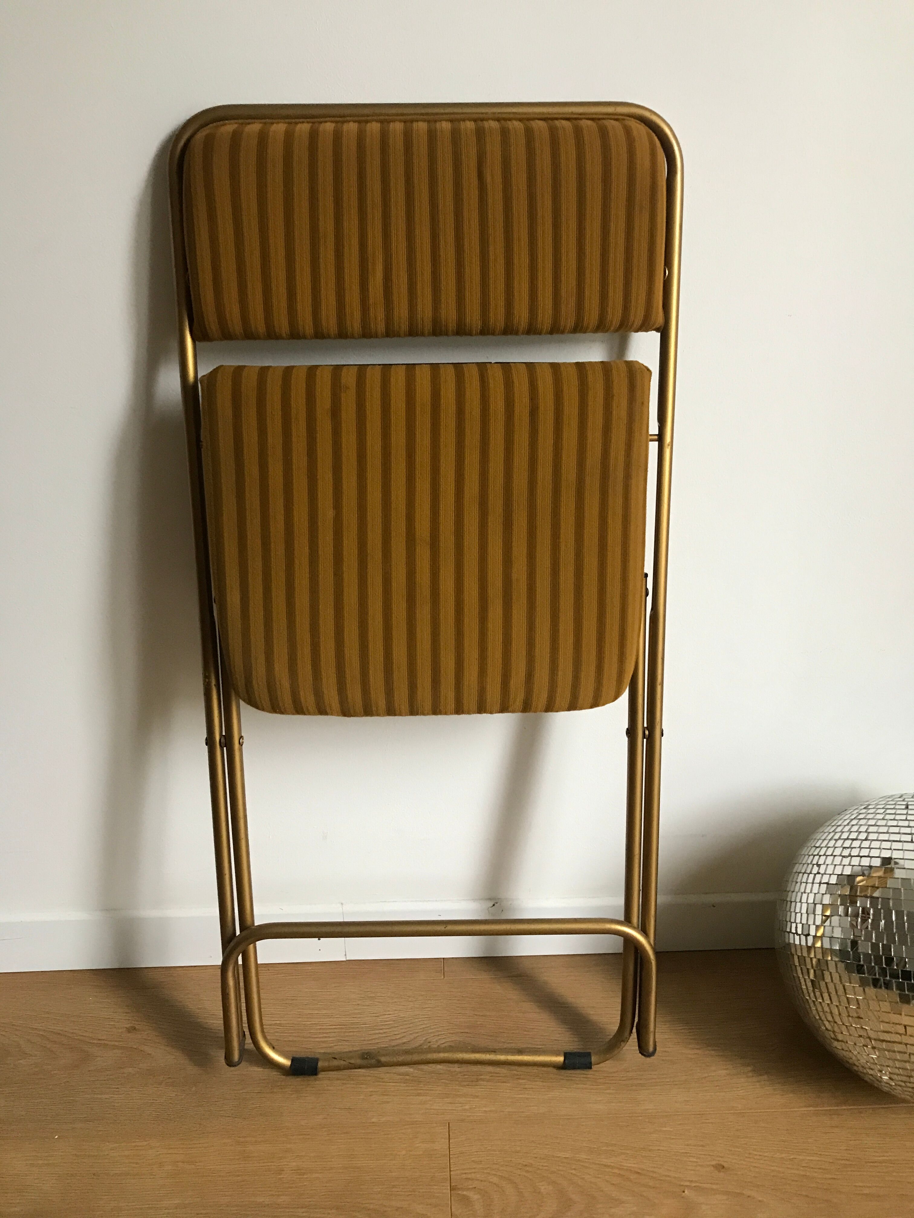 Vintage folding chair lafuma chantazur with striped gold fabric