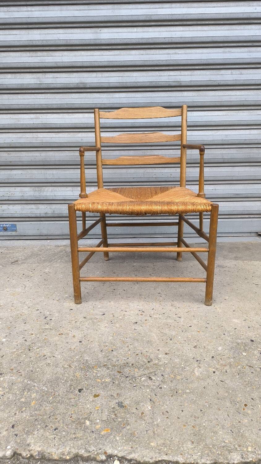 Early 19th century stepped back armchair