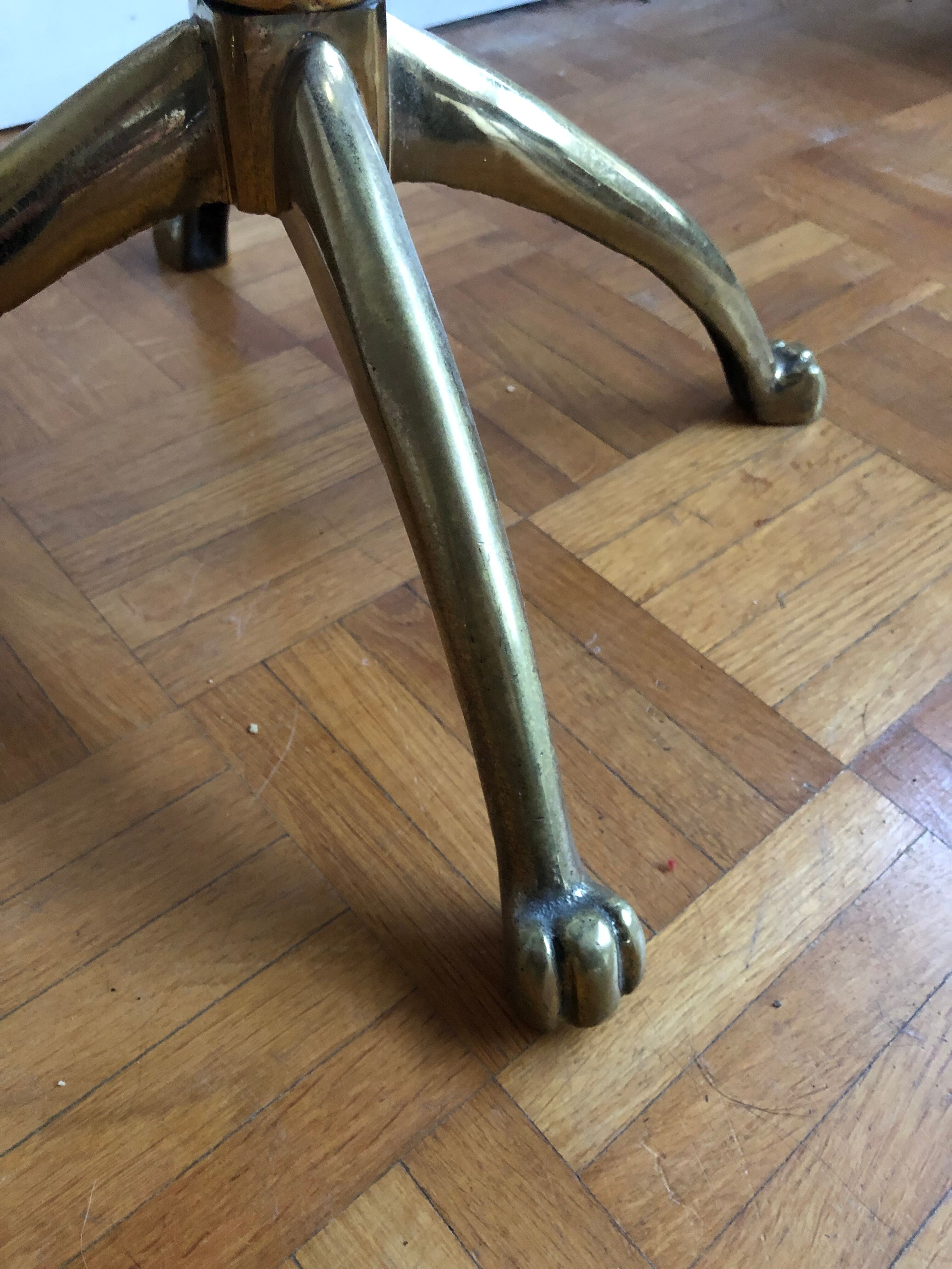 Pair of Chesterfield style brass and leather stools