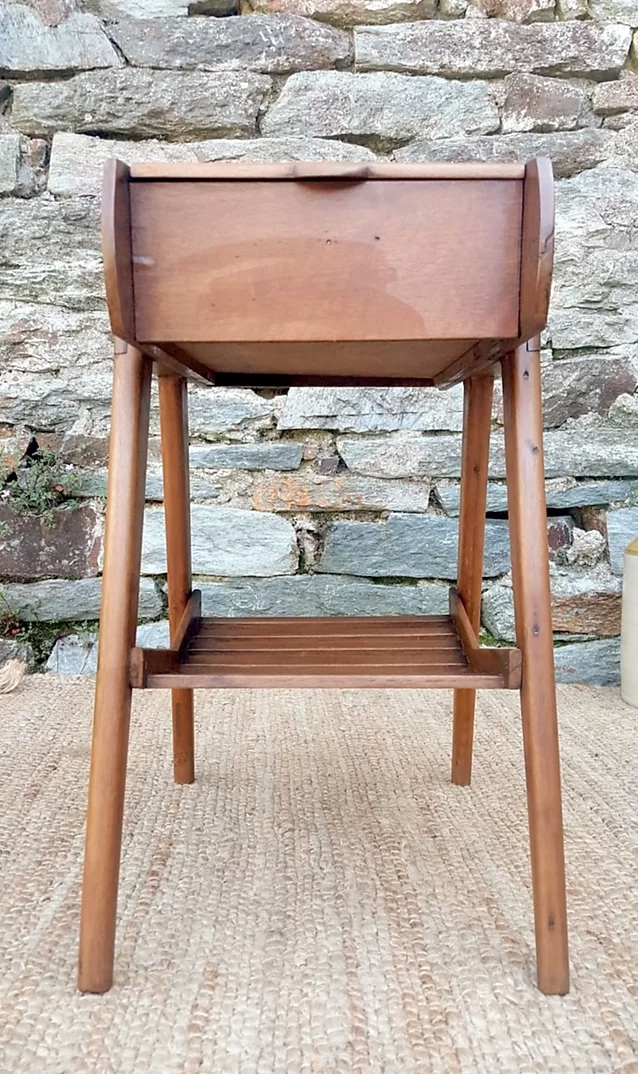 Former Scandinavian wooden sewing cart
