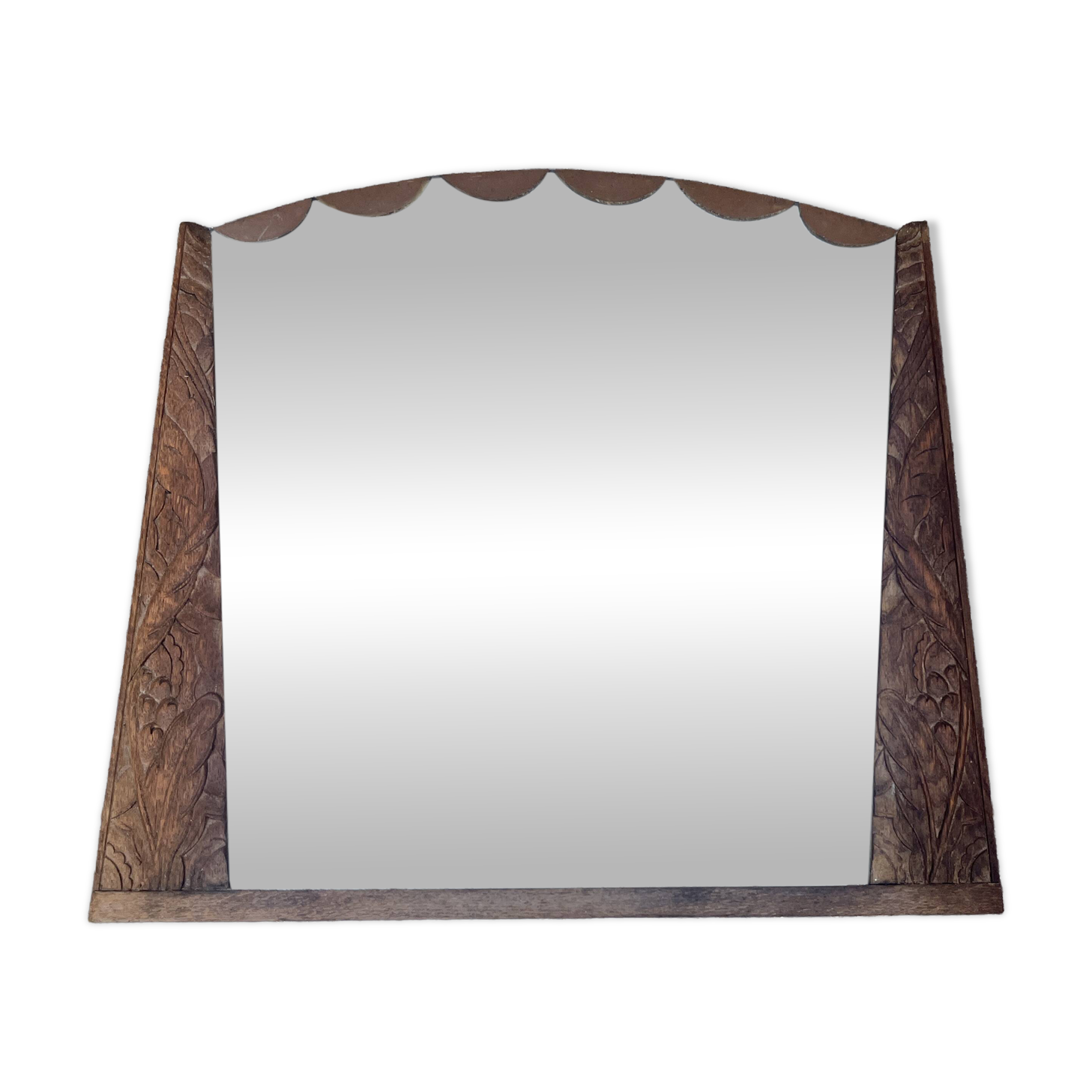 Art Deco mirror with carved wood, featuring floral motifs from the 1930s.