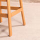 Children's high chair in solid tinted beech, seat and back in imitation cream leather, certification