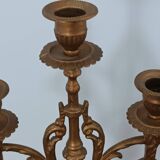 Bronze candlestick with lion head decoration