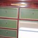 Empire-style mahogany cabinet – 12 drawers lined with green leather –